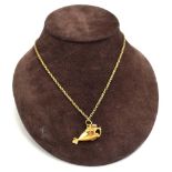 A 9ct yellow gold fine ropetwist necklace suspending a yellow metal pendant in the form of a