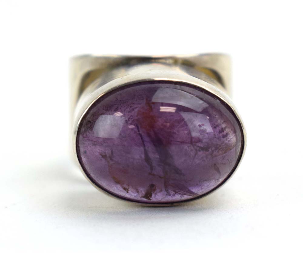 A late 20th century silver 'poison' ring set cabochon amethyst, maker PGW, London 1991, - Image 5 of 16