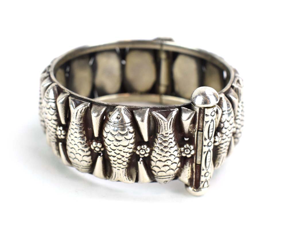 A late 20th century Continental metalware hinged bracelet relief decorated with stylised fish and - Image 4 of 6