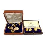 A pair of Edwardian Scottish 18ct yellow gold cufflink's of oval form relief decorated with