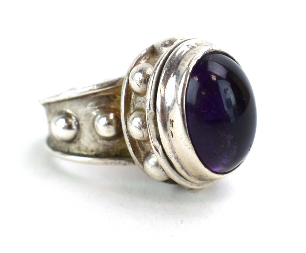 A late 20th century silver 'poison' ring set cabochon amethyst, maker PGW, London 1991, - Image 13 of 16