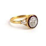 A 19th century yellow metal ring of slightly domed form set six old cut diamonds within a border of