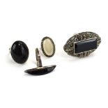 Four silver and metalware dress rings set black onyx and other stones (4)