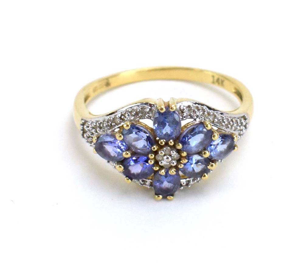 A 9ct yellow gold dress ring set pale blue stones and small diamonds in a flowerhead setting, - Image 12 of 12