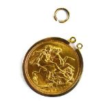 A sovereign dated 1915 in a loose 9ct yellow gold mount, overall 9.
