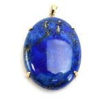 A 14ct yellow gold pendant of oval form set polished lapis lazuli, drop l. 5.