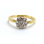 An 18ct yellow gold and platinum highlighted cluster ring set small diamonds, ring size P 1/2, 2.