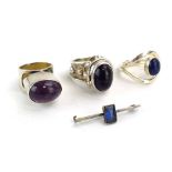 A late 20th century silver 'poison' ring set cabochon amethyst, maker PGW, London 1991,