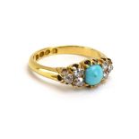 A late 19th century 18ct yellow gold ring set cabochon turquoise and six old cut diamonds in a