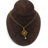 An Edwardian 15ct yellow gold ropetwist necklace suspending an openwork filigree pendant set