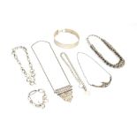 Six late 20th century silver and metalware necklaces including a hammered metalware choker,