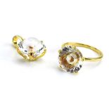 A 9ct yellow gold 'Wheel of Light' ring set white quartz and Rio golden citrine, ring size Q,