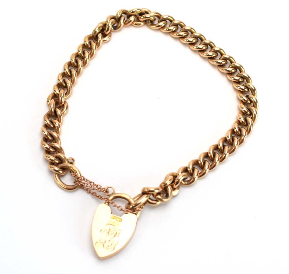 A 9ct yellow gold curblink bracelet with heart shaped padlock clasp, maker JG&S, 26. - Image 3 of 5