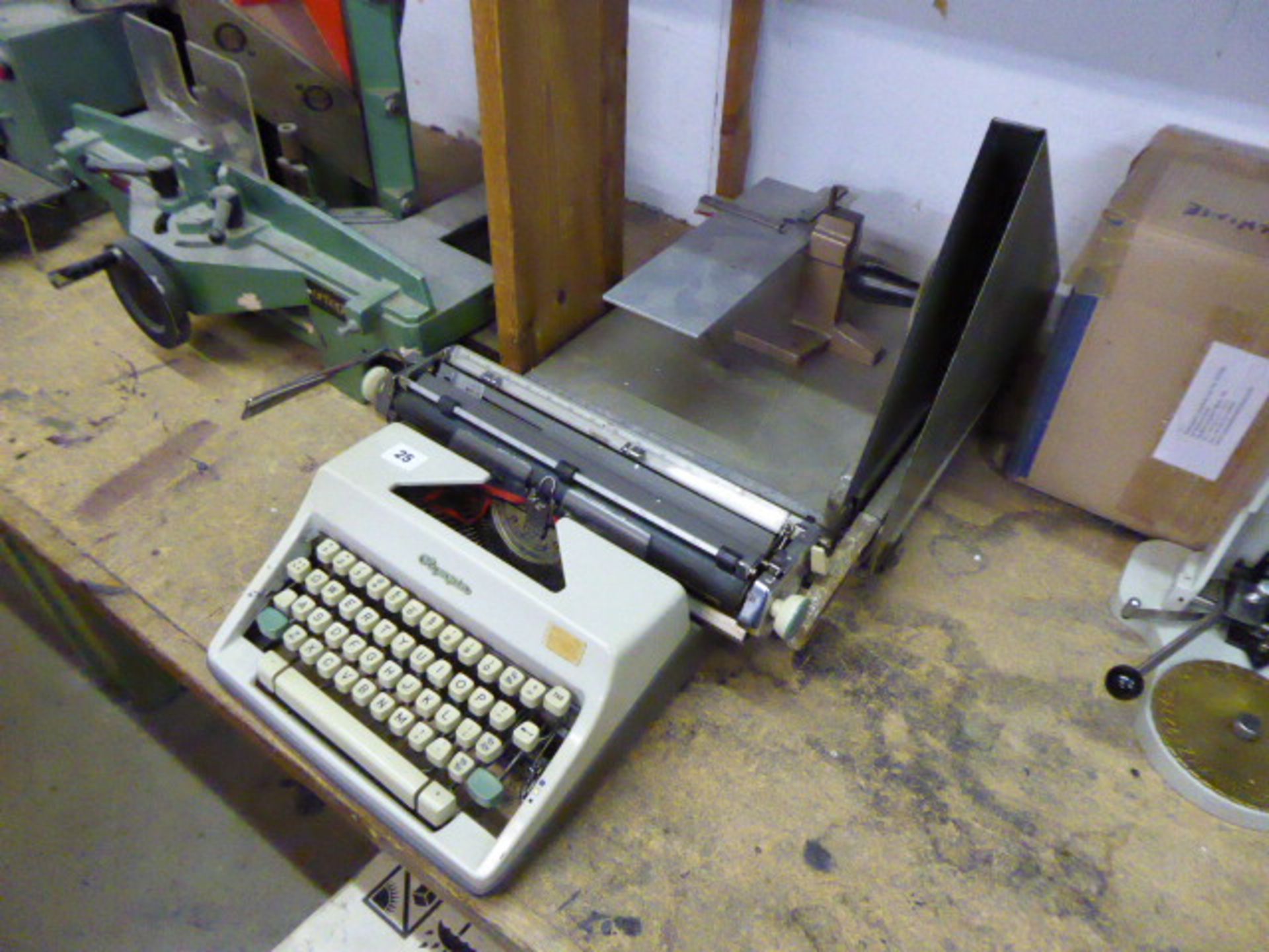 Olympia typewriter, paper guillotine and custom made model makers table