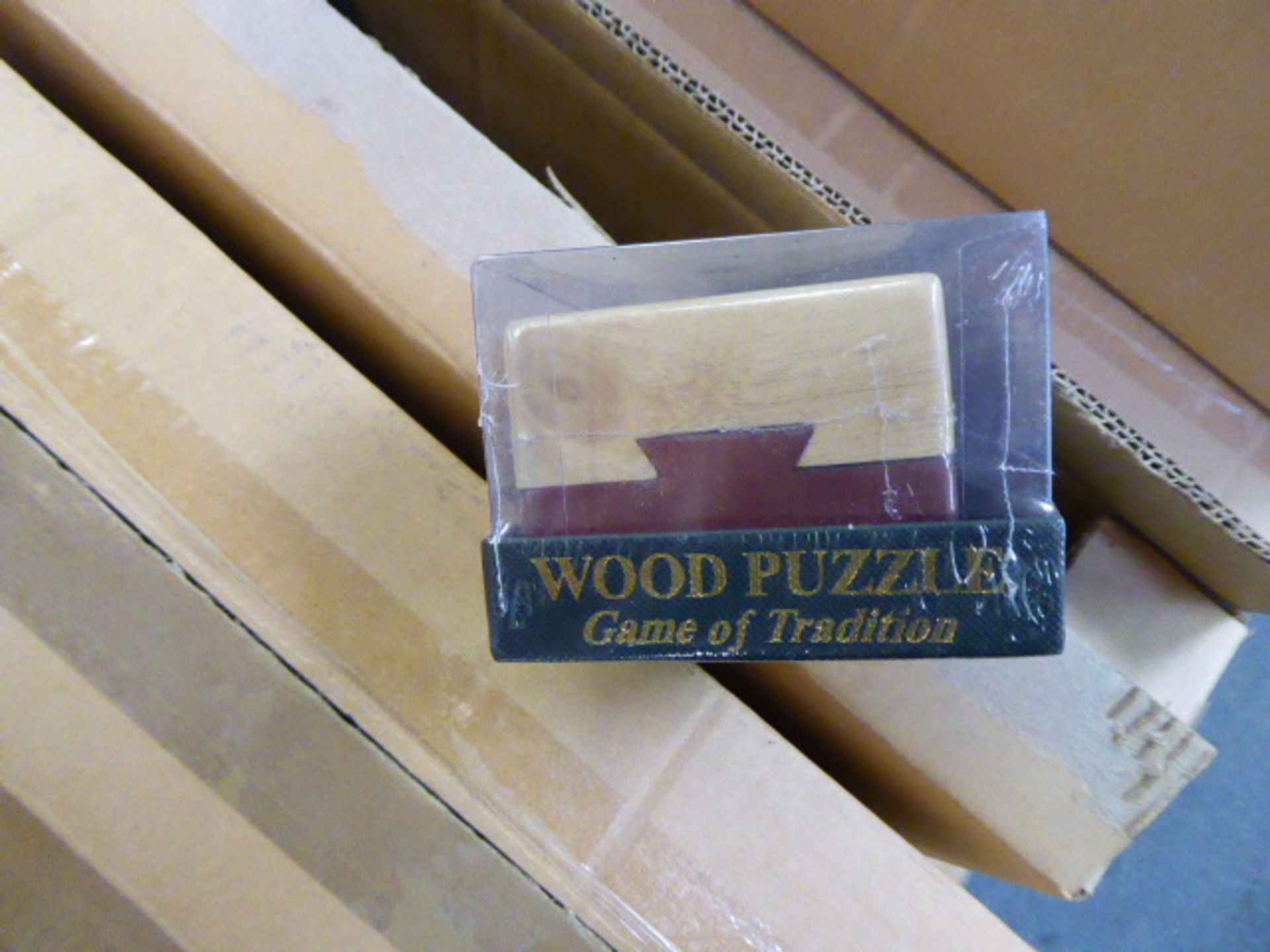 Approximately 70 wooden toy puzzles