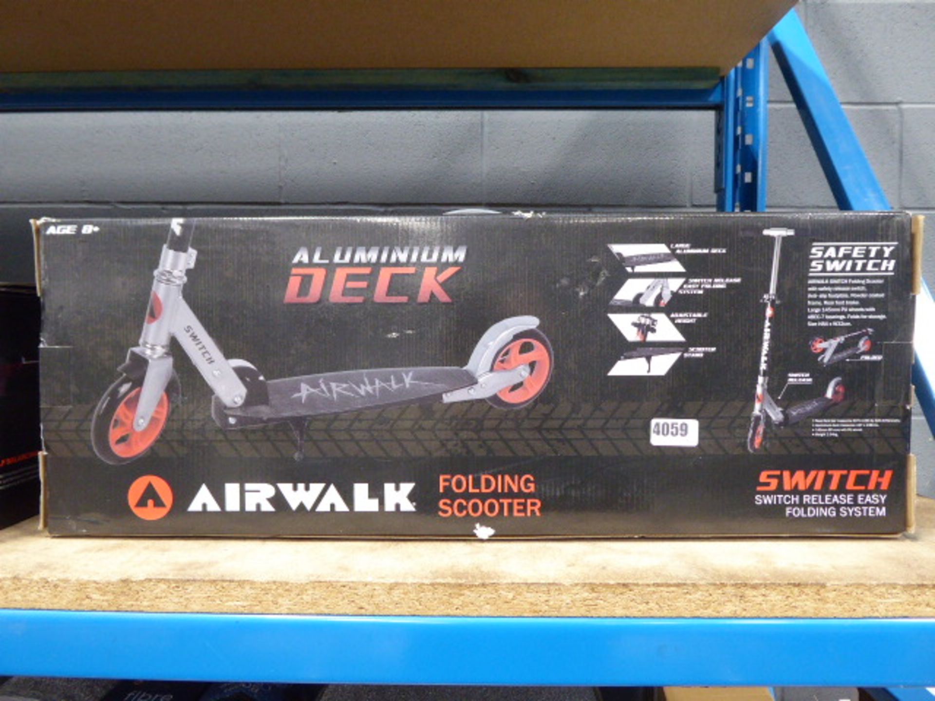 Boxed AirWalk folding scooter