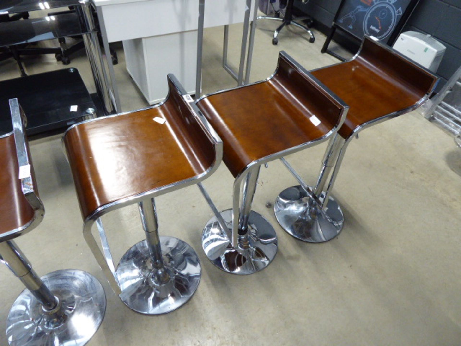 3 chrome framed wooden seated bar stools