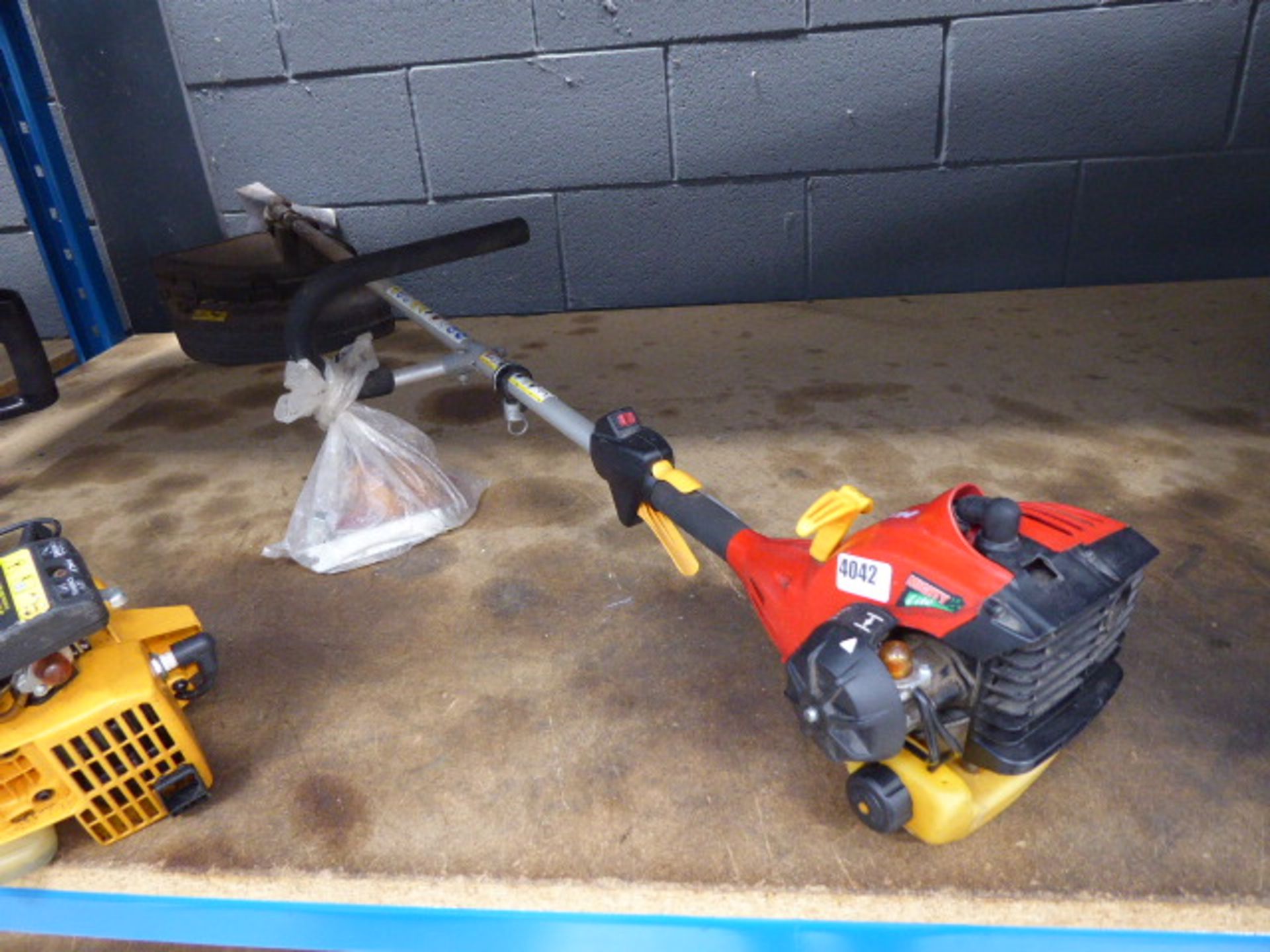 Rid Homelite petrol powered brush cutter