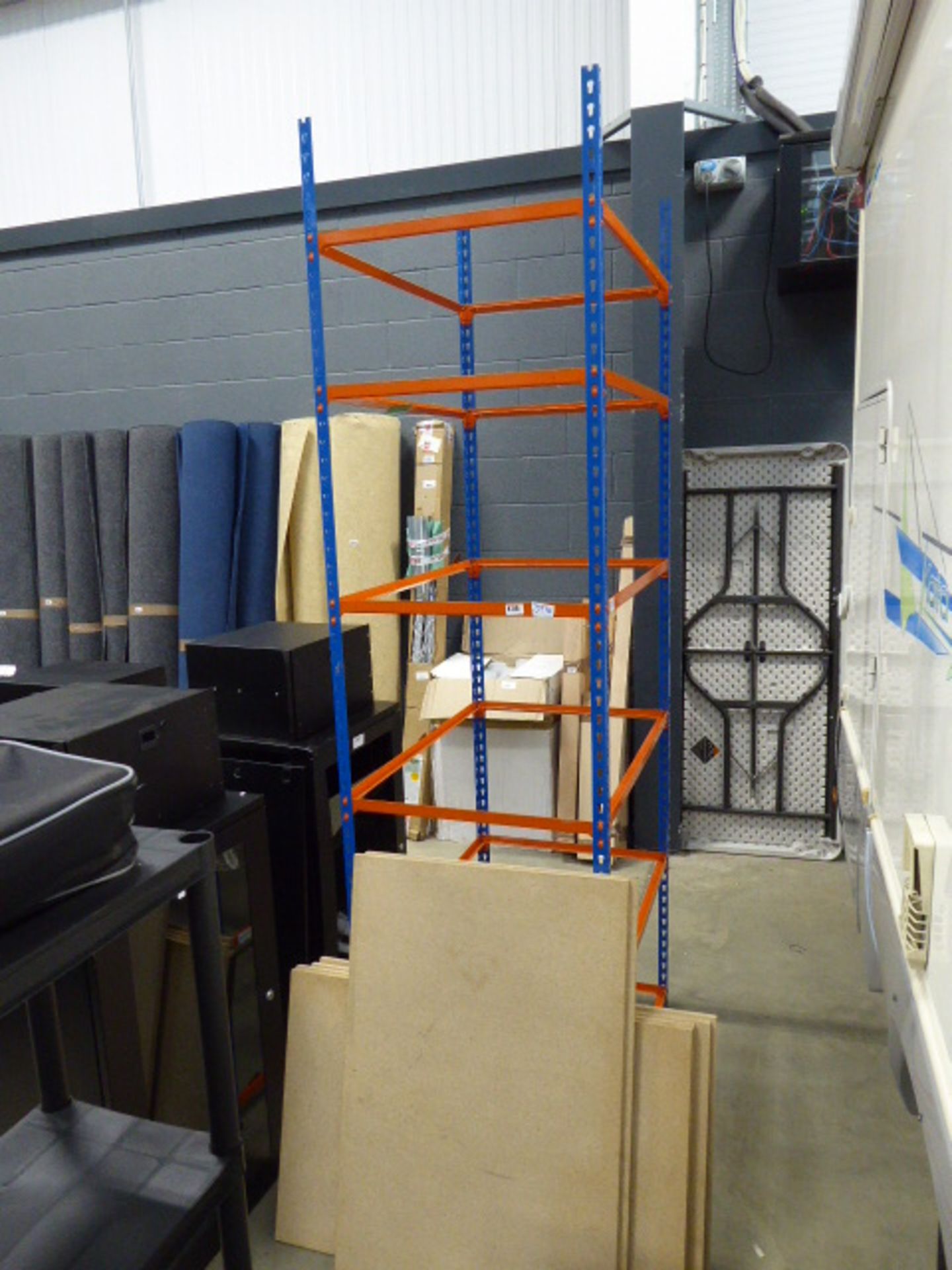 Single section of orange and blue racking