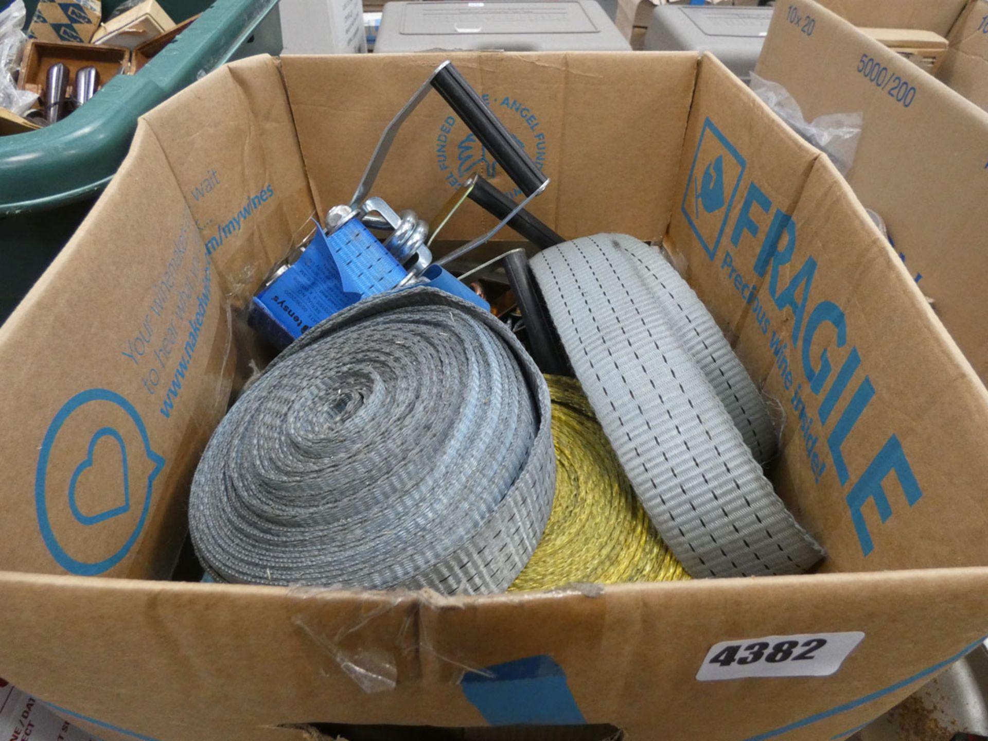Box of used lorry straps