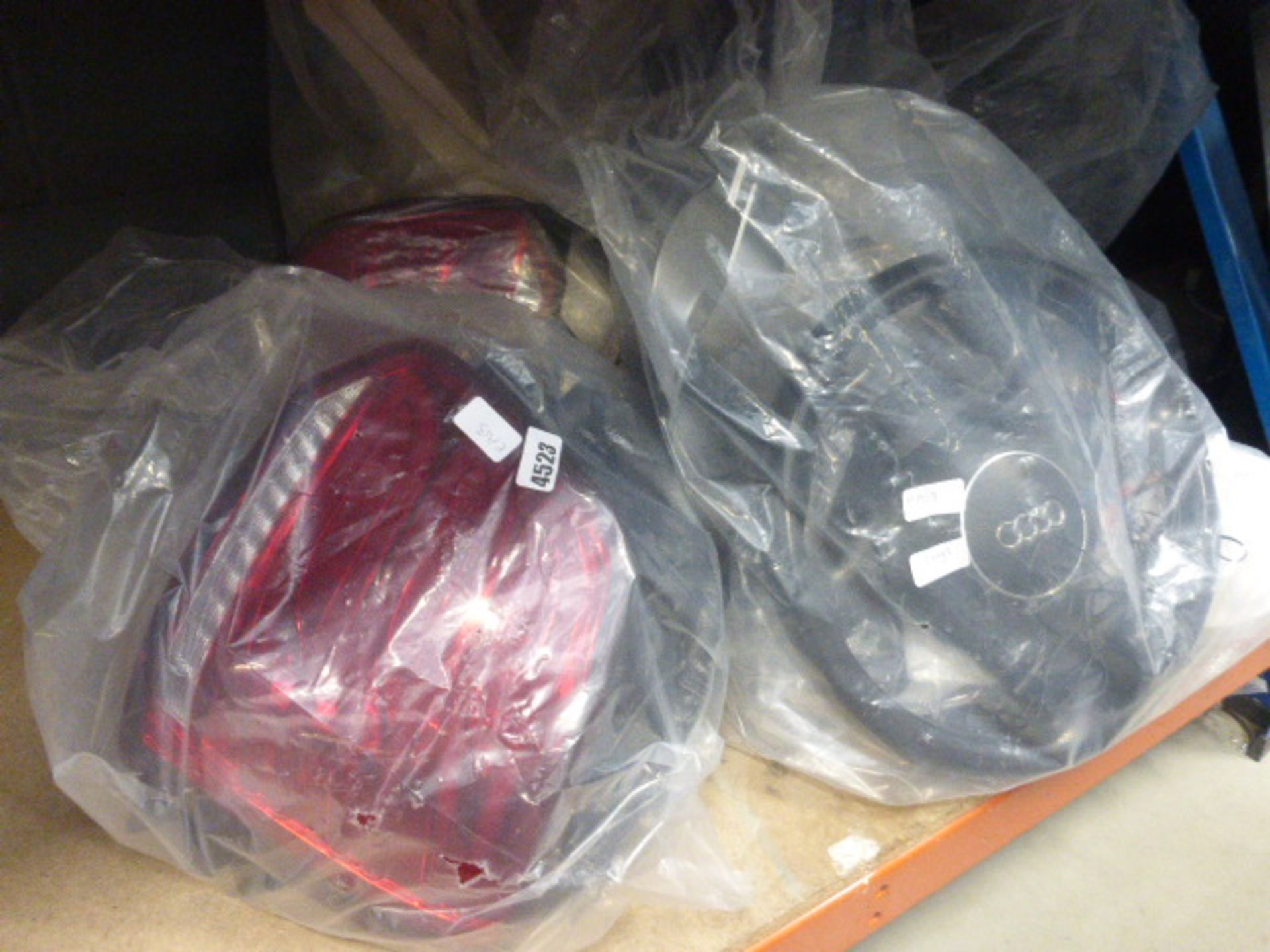 5 Bags of car parts to inc. Audi steering wheels, lights, trim parts, brackets, etc