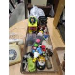 A box containing Simpson, Mr Men and other ornamental figures, plus a money box and toys