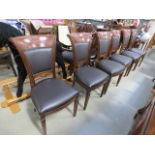 Six beech and brown leather boardroom chairs