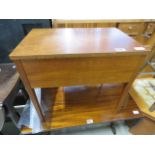 A teak sewing box