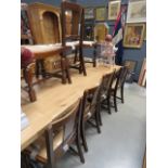 Seven oak dining chairs