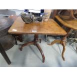 A Victorian tripod side table