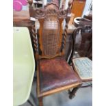 An oak barley twist dining chair with bergere backrest