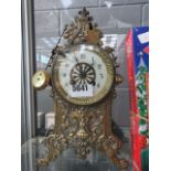 A brass mantle clock