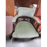 Edwardian bow back armchair with green fabric