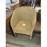 A Lloyd Loom style armchair