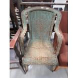 Painted wicker armchair