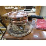 Charger with floral etched pattern, together with a copper Nader cooking pot