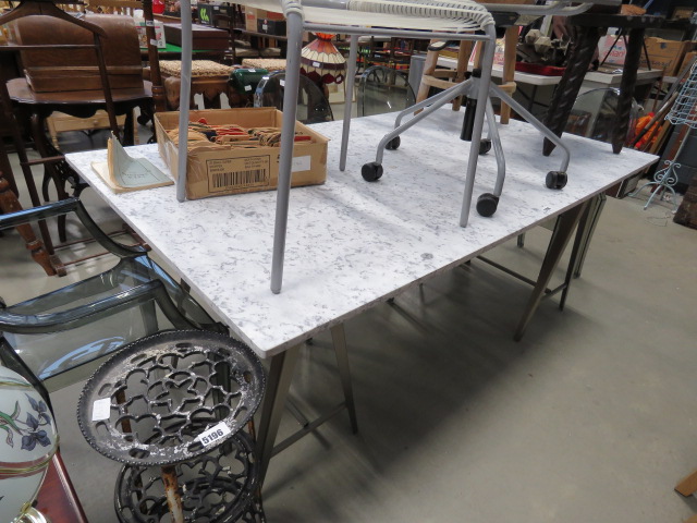 Faux marble trestle dining table