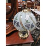 Brass finished table lamp with glass shade