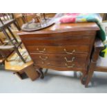 A serpentine fronted cutlery chest of 4 drawers