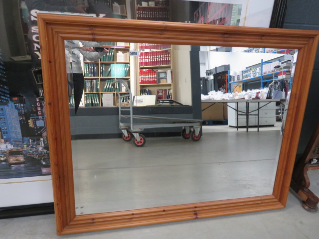 Rectangular bevelled mirror in pine frame