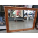 Rectangular bevelled mirror in pine frame