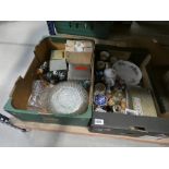 2 boxes containing glassware, ornamental figures and general crockery