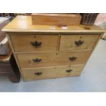 A waxed pine chest of 2 over 2 drawers