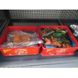 A cage containing 2 boxes of a quantity of fishing lures, scissors and weights
