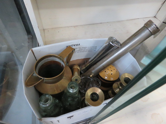 5555 - A box containing vintage torches, brass candlesticks, brass jug and glass bottles
