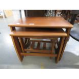 333 - A nest of 3 teak tables