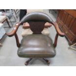 Green leather effect swivel office chair