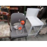 Two plastic and metal chairs