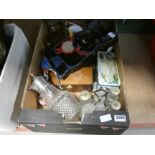 A box containing a cruet set, claret jug, tins, boxes and general glassware