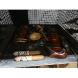 Cage of ornamental African figures, castanets and ornaments